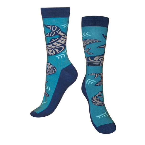 Pair of blue socks with fish pattern on a white background