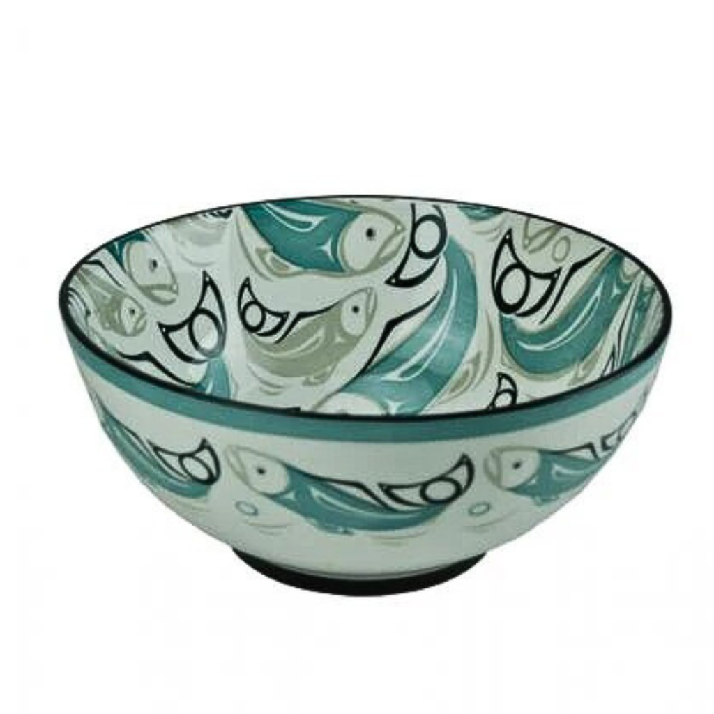 Ceramic bowl with fish pattern on a white background